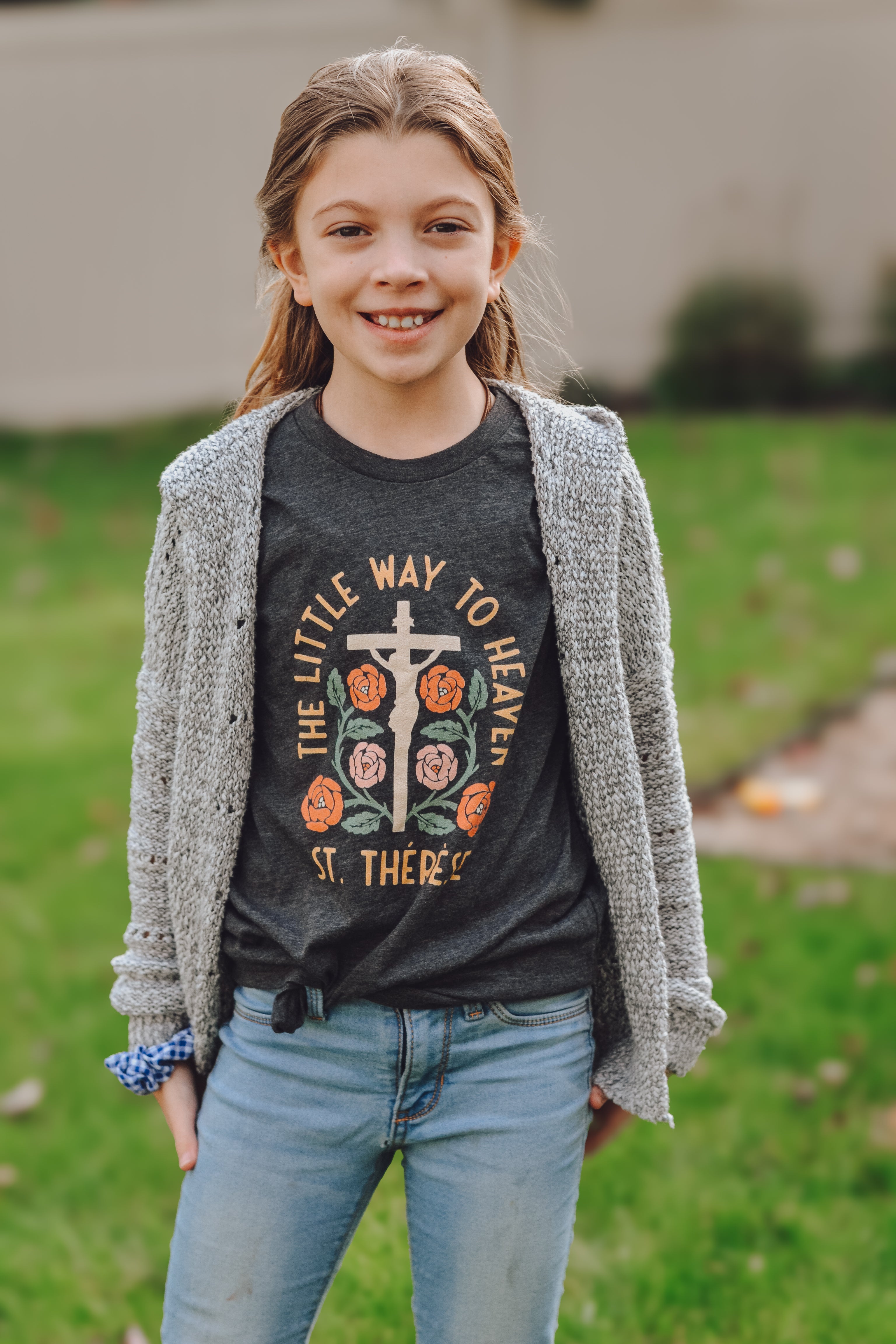young girl with st. therese t-shirt