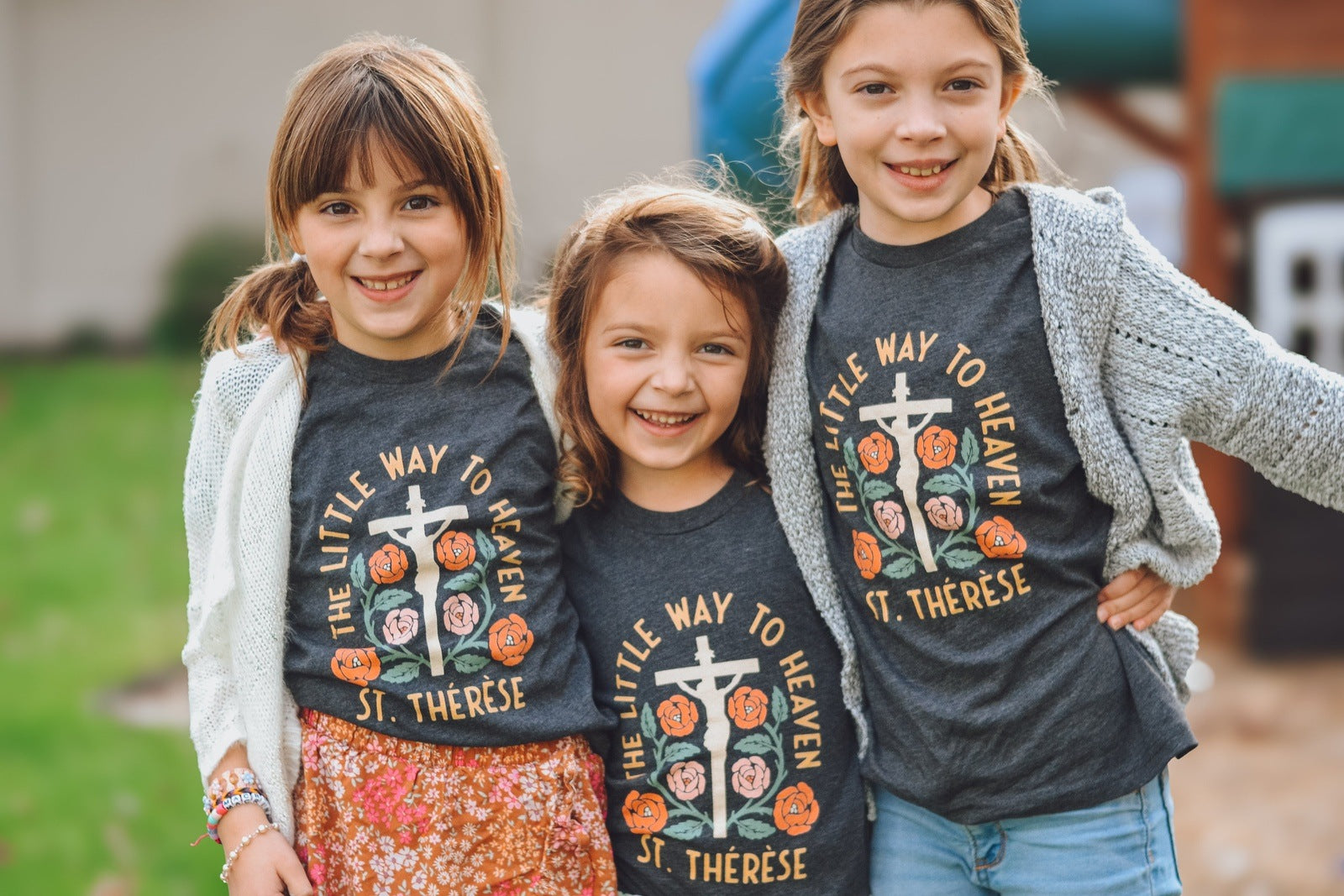 young girl with st. therese t-shirt
