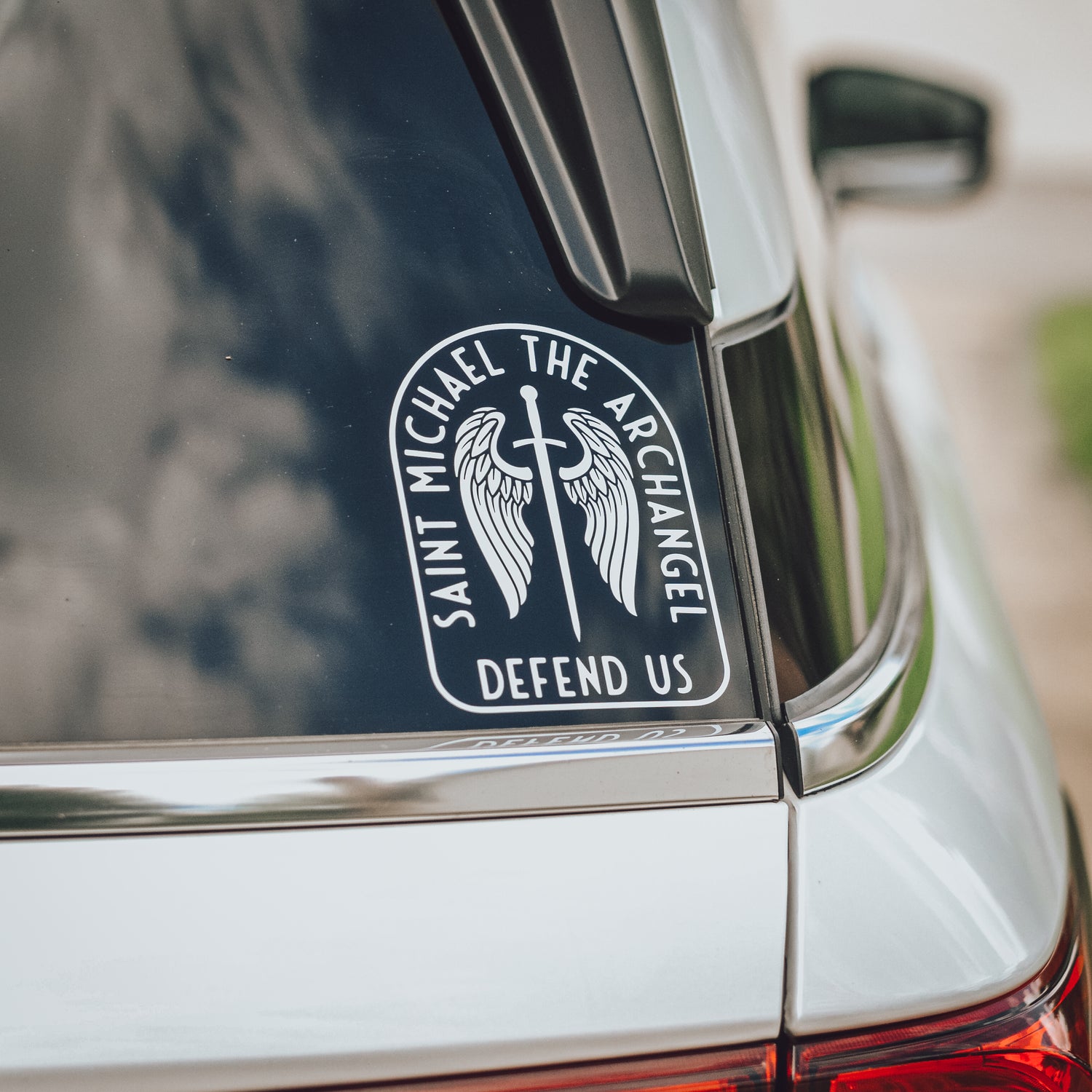 saint michael catholic car decal on car window