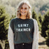 Saint Trainer Catholic T-shirt - Little Way Design Co.