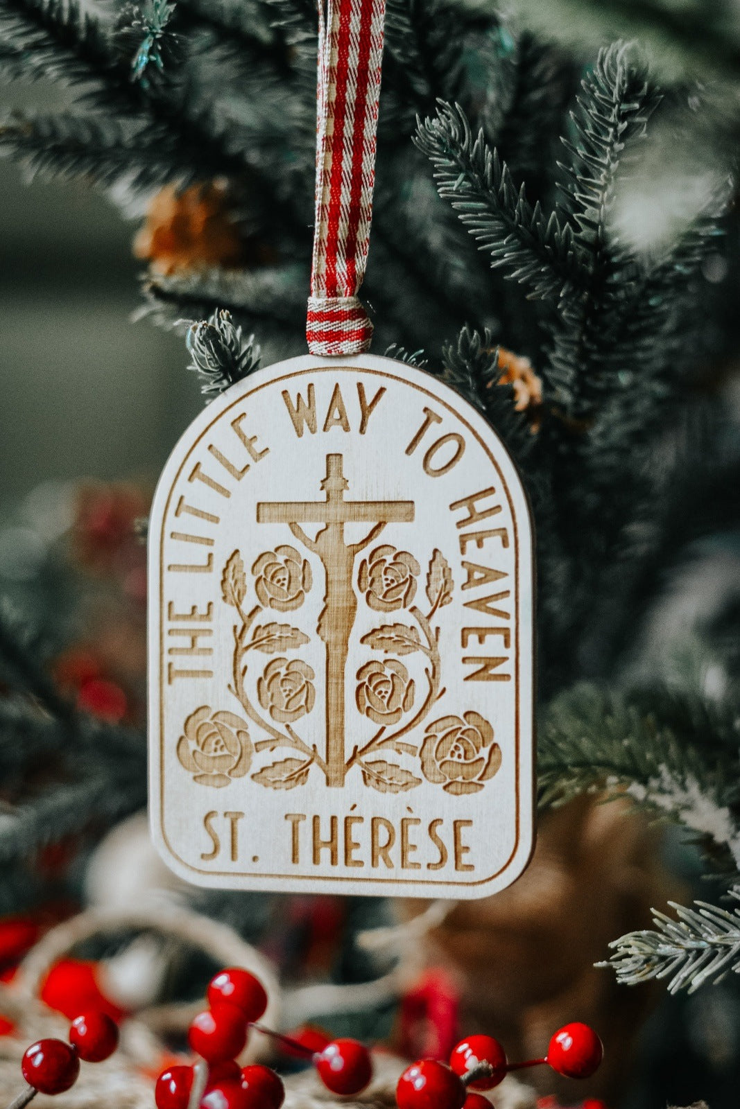 st therese christmas tree ornament hanging on tree